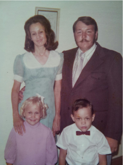 Julie Brown with her family when she was a young girl.