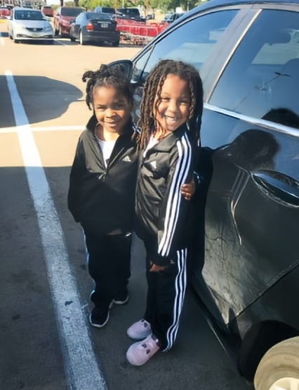 Two of the children Arquilla Walker has raised, with help from ACH's Kinship Connections.